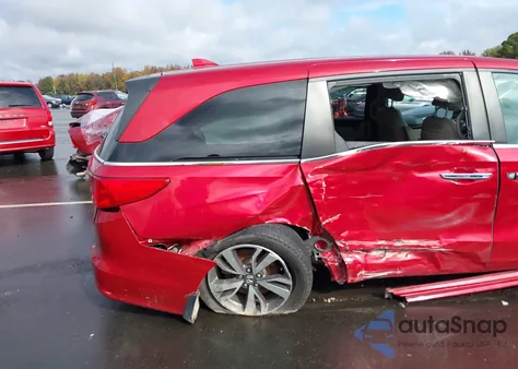 2023 Honda Odyssey Touring z USA, uszkodzony, nr VIN 5FNRL6H8XPB014625